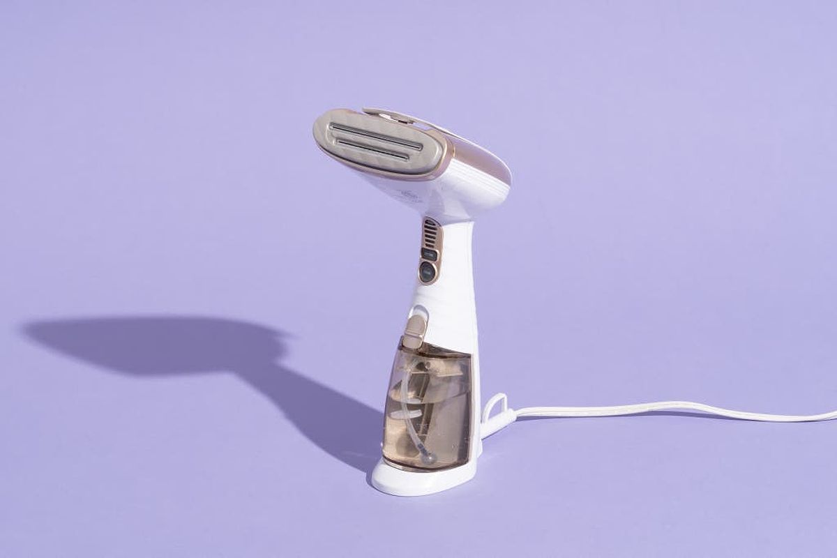 A Conair Turbo ExtremeSteam Handheld Fabric Steamer