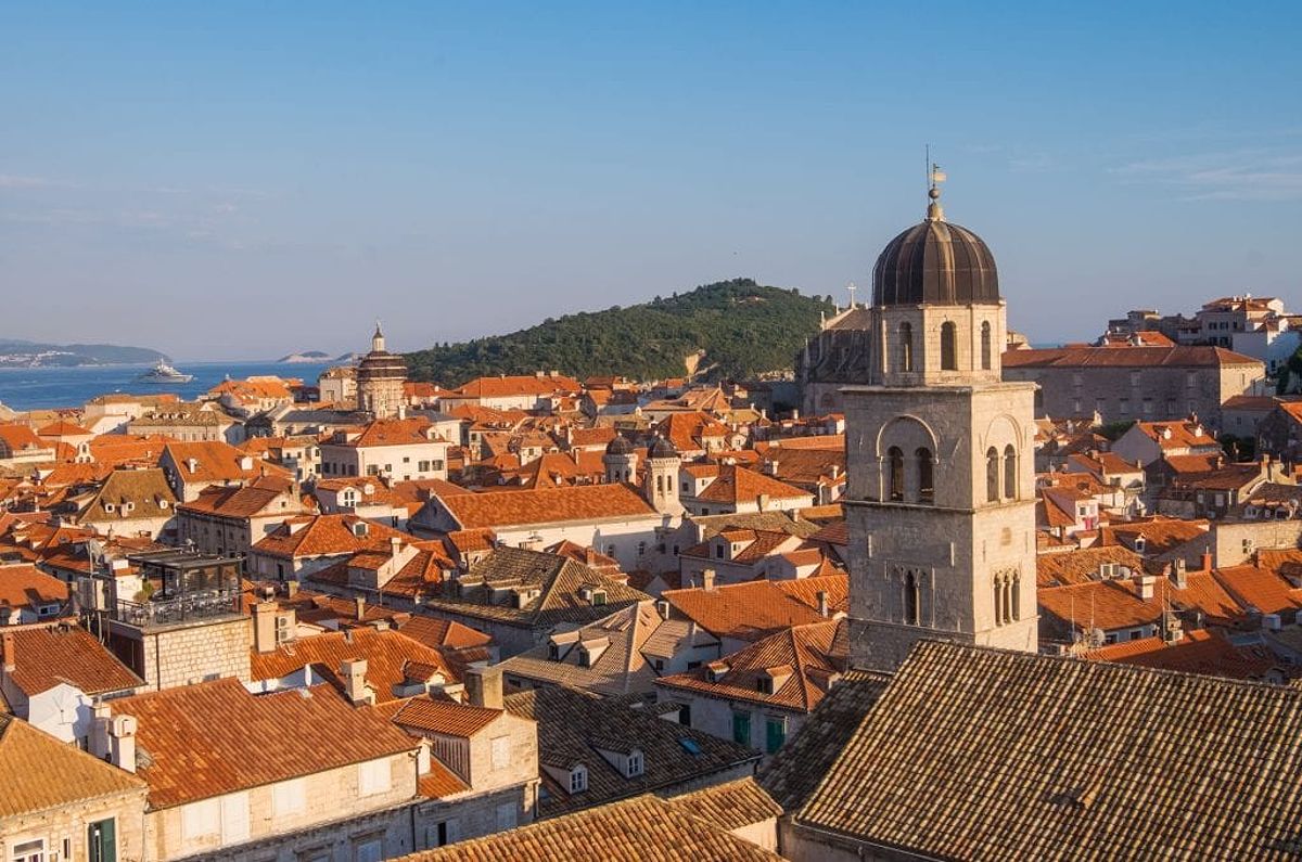 A view of the city of Dubrovnik from the walls, with lots of orange terra-cotta roofs