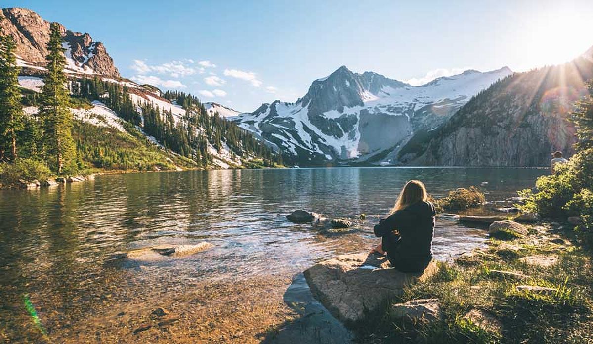 A woman admiring the view in Snowmass Mountain