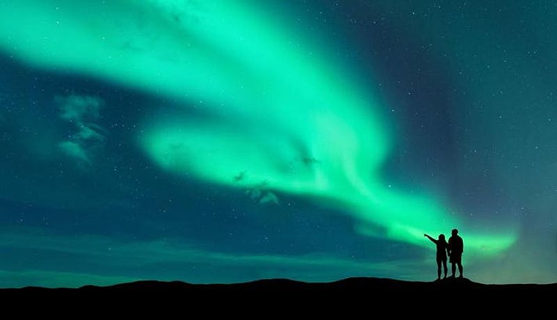 Aurora borealis over a house in Norway