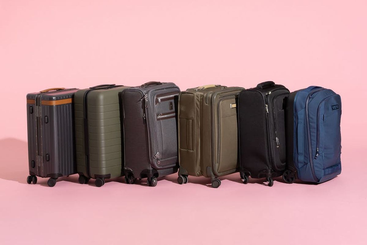 Six of the carry-on suitcases we tested, shown lined up