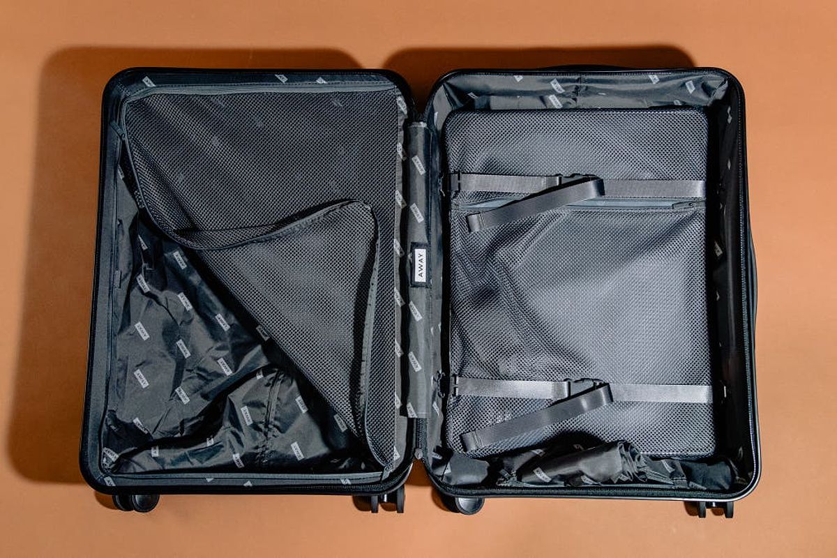 Top view of an opened Away The Medium suitcase