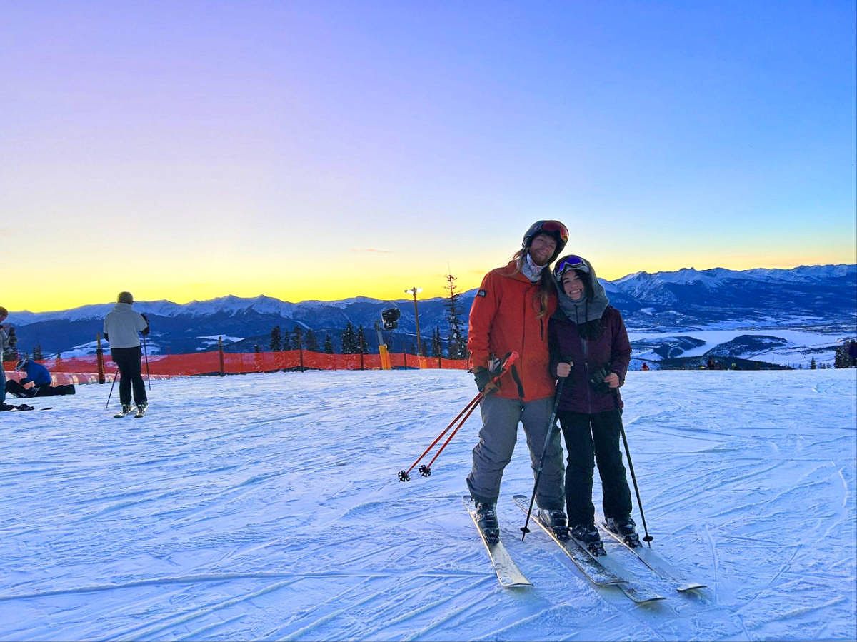 Travel Lemming editor Abigail and her husband skiing at Keystone Resort at night