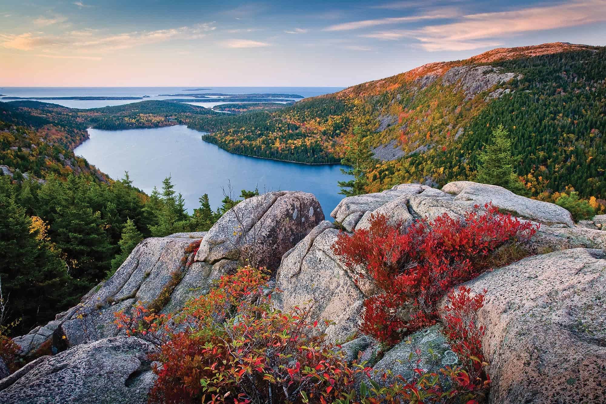 View of fall foliage from a mountain in Acadia National Park in Maine